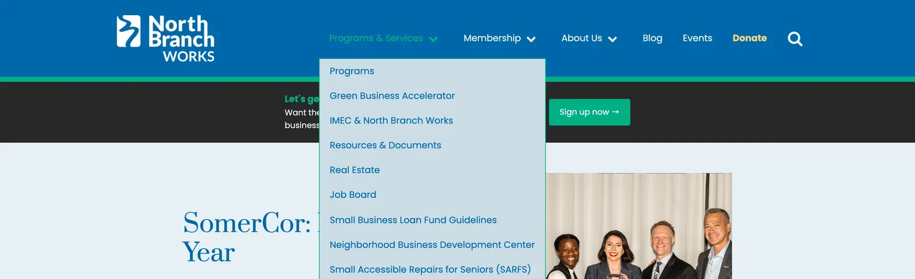 The Programs & Services menu open, listing ten programs from the Green Business Accelerator to the Local Industrial Retention Initiative